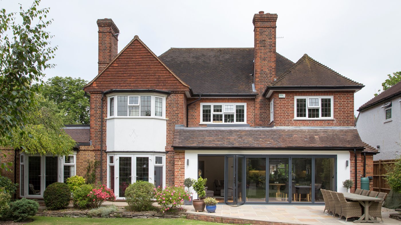 Traditional UK house with a newly finished tiled roof